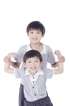 Portrait of Asian brothers hugging over white background