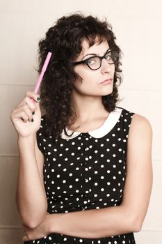 Portrait of a pensive woman in a vintage dress.