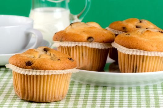 Fresh muffins on the table.