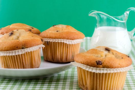 Fresh muffins on the table.