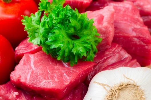 fresh raw meat on wooden board