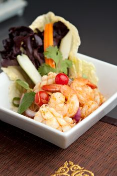 Thailand style seafood salad with clear vermicelli style rice noodles and veggies.