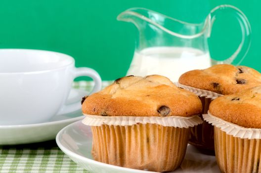 Fresh muffins on the table.