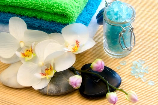 Spa concept with zen stones and orchid