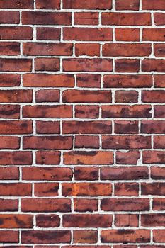 Close up of a red brick wall that makes a great background texture.