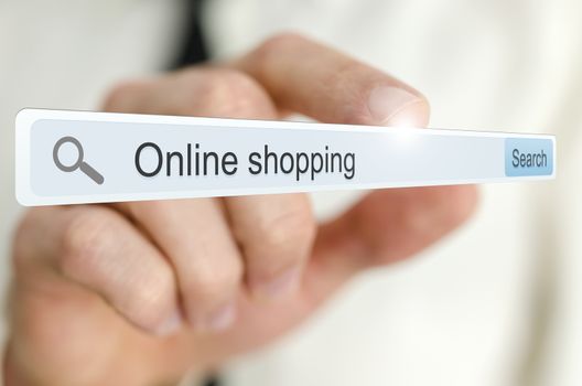 Online shopping written in search bar on virtual screen.