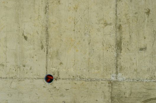 Hole for electricity and light in concrete ceiling in house under construction.