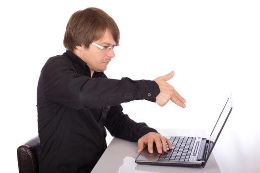 Business man in depression shoot on his laptop with his fingers. Isolated on white background.