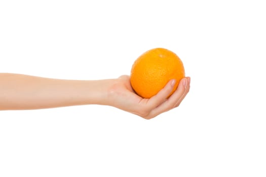 Orange in a child hand. Isolated on white background.