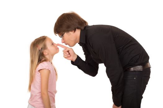 Despairing father pointing the finger and explains what's wrong to her little daughter. Conflict between generations. Isolated on white background.