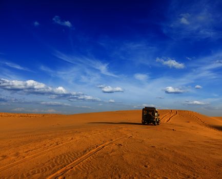 Desert safari - awd car in dunes. Thar desert, Rajasthan, India