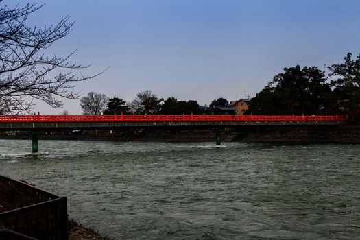 A red bridge over water Japan