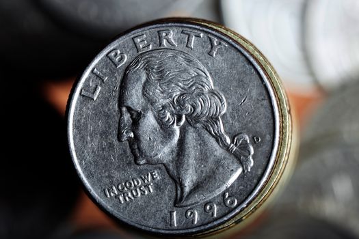 Close-up photo of US coin with George Washington portrait