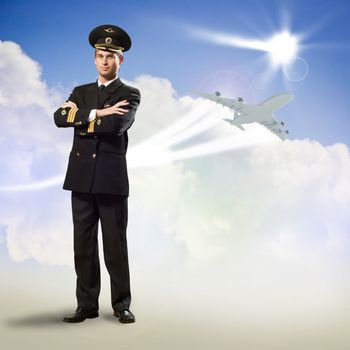 pilot is in the form of arms folded, against the sky, the clouds and the plane