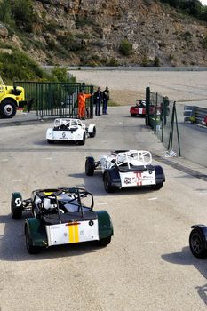 chases of Caterham on the circuit of the Cevennes with Ales in the French department of Gard the May 24th and 25th, 2013. on the starting line before the race
