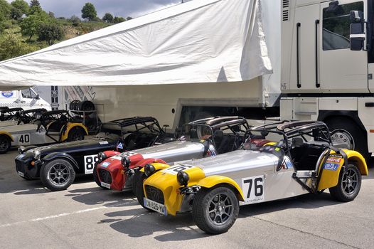 chases of Caterham on the circuit of the Cevennes with Ales in the French department of Gard the May 24th and 25th, 2013. The Caterham stands