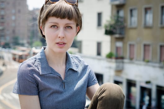 young beautiful hipster woman in the city