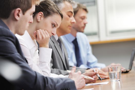 Business people bored during a meeting