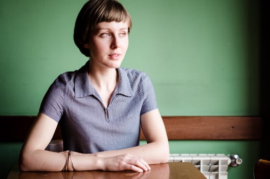 young beautiful hipster woman at the bar
