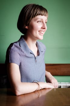 young beautiful hipster woman at the bar