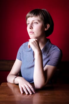 young beautiful hipster woman at the bar