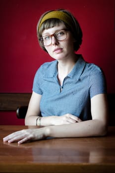 young beautiful hipster woman at the bar
