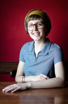 young beautiful hipster woman at the bar