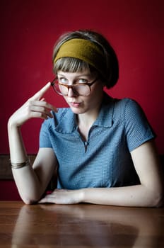 young beautiful hipster woman at the bar