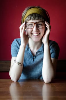 young beautiful hipster woman at the bar