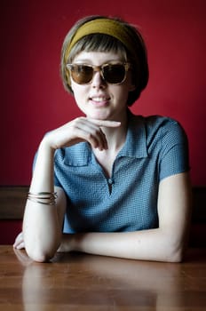 young beautiful hipster woman at the bar