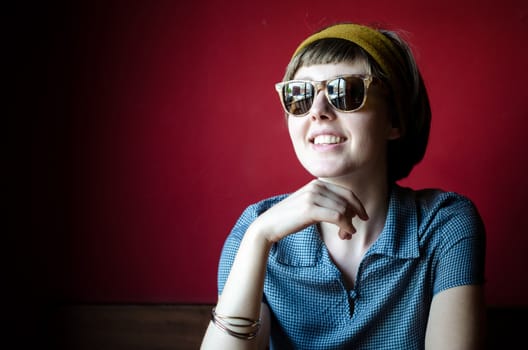 young beautiful hipster woman at the bar