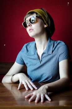 young beautiful hipster woman at the bar