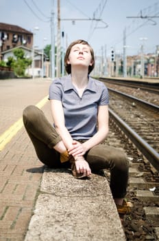 young beautiful hipster woman at the station