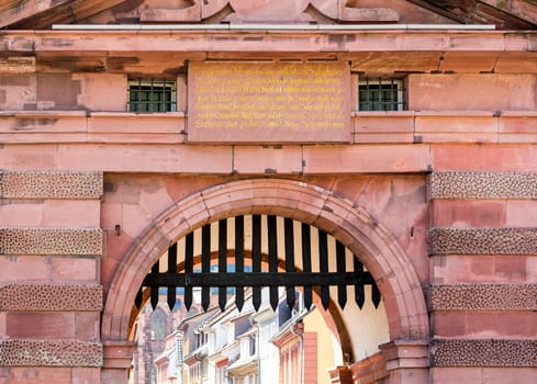 Detail of medieval gateway and portcullis from old bridge into town of Heidelberg Germany