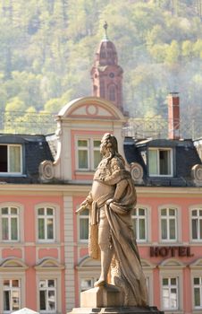 Statue of Karl Theodor from 1792 one of elector builders of old bridge leading to ancient town city of Heidelberg Germany