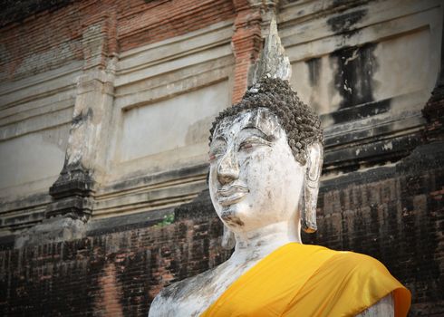 Ancient Buddha statues at Wat Yai Chai Mongkol in Ayutthaya, Thailand 