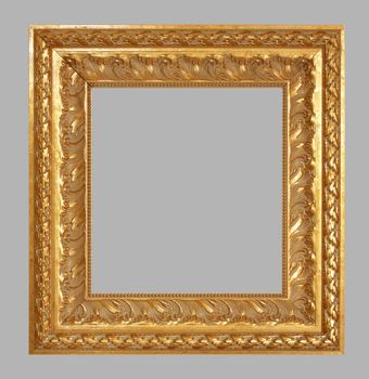 Gold antique frame isolated on gray background.