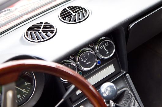 Closeup on old classic car interior, retro oldtimer