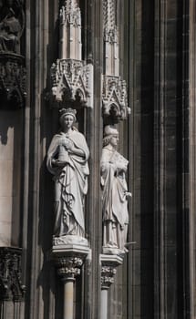 Detail of stone figures in the facade of Cologne cathedral