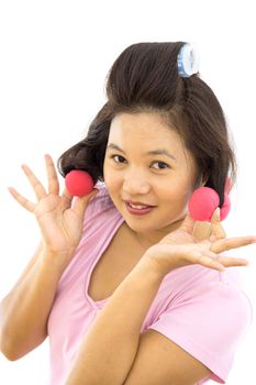 pretty young adult woman with hair curlers on white background