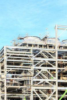 Assembling of liquefied natural gas Refinery Factory with LNG storage tank using for Oil and gas industry background