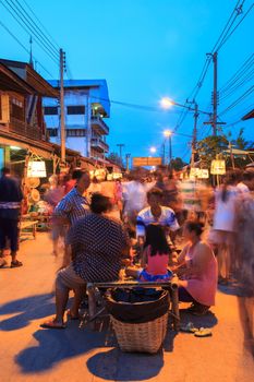 SUKHOTHAI, THAILAND - MAY 4 : Unidentified tourists are shopping and eating at Rim Yom 2437  market on May 4, 2013 in Sukhothai, Thailand.