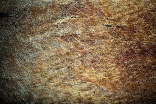 Close-up photo of the old wooden texture with scratches