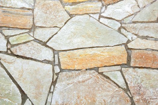 Masonry with white, yellow and grey bricks