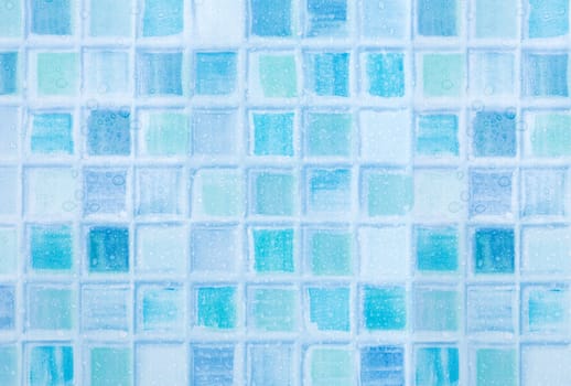 Blue Tiles in Bathroom With Water Drops