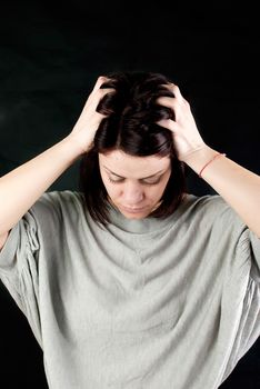 conceptual portrait of stressed abused young woman 