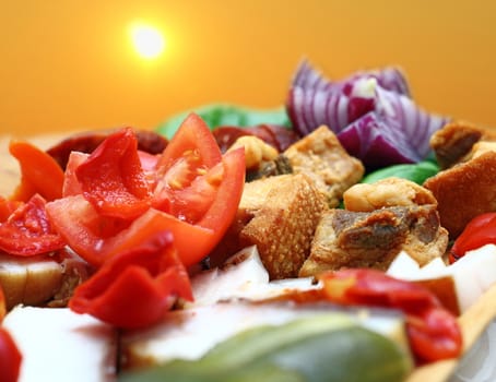romanian traditional appetizer with pork meat, onion and fresh tomato