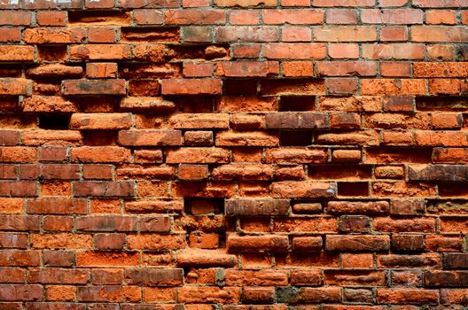 Old vintage texture of brick wall with holes