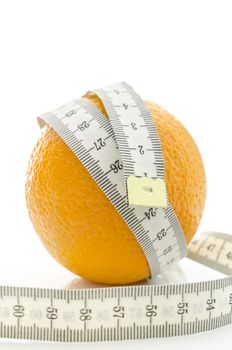 Orange wrapped with measuring tape.