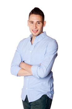 Happy smiling young male business entrepreneur professional dressed casual standing with arms crossed, isolated.